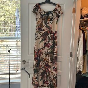 Deeply colored floral long dress.  Pull down shoulders.  Tall side slit.